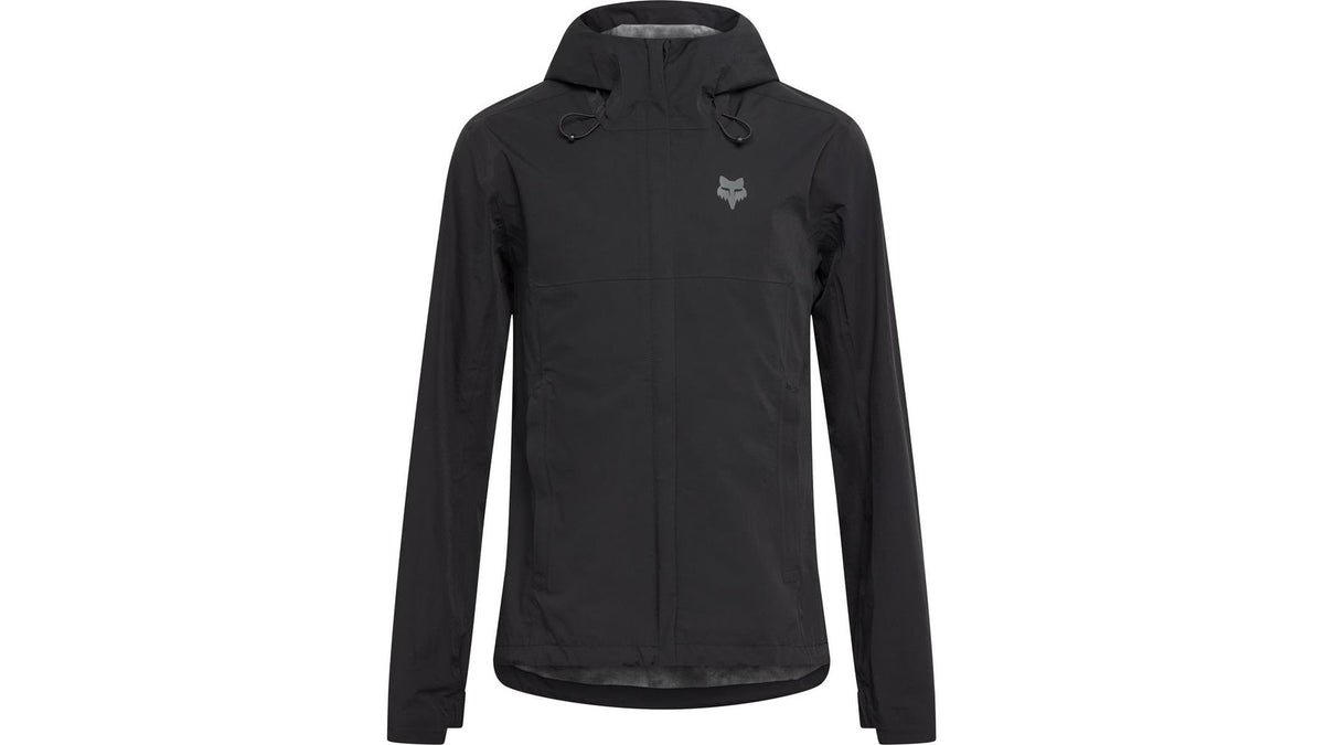 Die FOX Ranger Water Jacket ist eine schwarze Kapuzenjacke mit langen Ärmeln, einem Reißverschluss vorne und einem kleinen Fuchskopf-Logo auf der Brust. Sie wurde speziell für Fahrradbegeisterte entwickelt und verfügt über verstellbare Kordelzüge an der Kapuze sowie einen leicht geschwungenen Saum. Das wasserabweisende Material sorgt dafür, dass Sie unterwegs trocken bleiben.