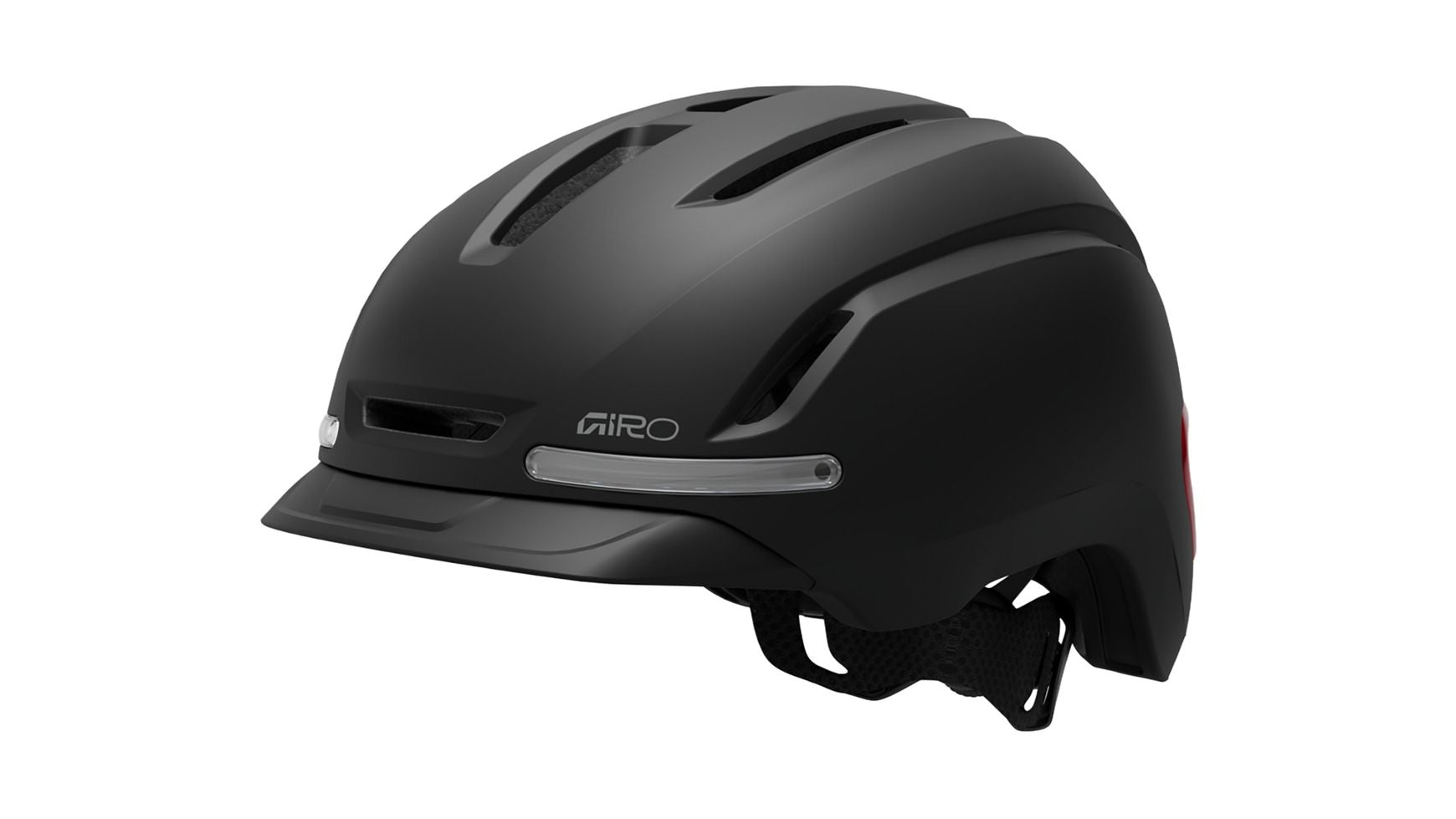 Der GIRO Giro Ethos MIPS Urbanhelm in mattem Schwarz verfügt über ein integriertes Visier, Belüftungsschlitze auf der Oberseite und eine integrierte LED-Hintergrundbeleuchtung, die auf weißem Hintergrund zu sehen ist.